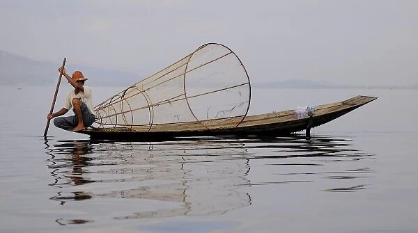 Asia, Myanmar (Burma), Lake Inle. A fisherman on Lake Inle