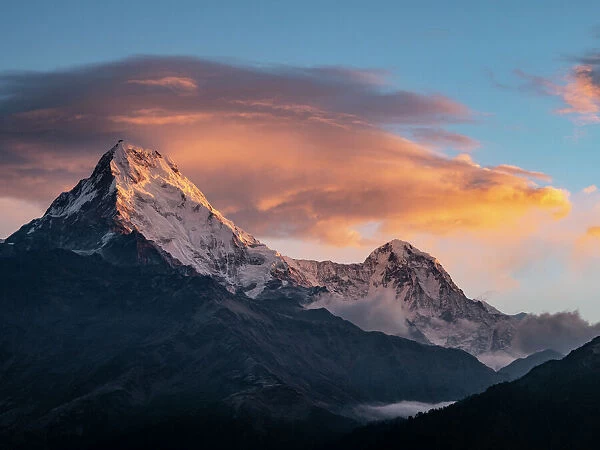 Asia, Nepal. Annapurna South (7, 219 Meter) and clouds at sunrise, viewed from Poon Hill