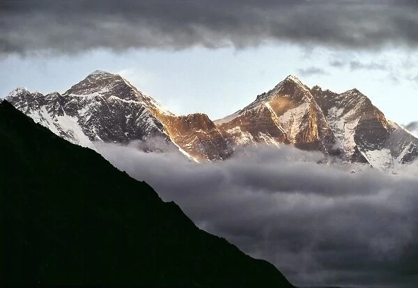 Asia, Nepal, Sagarmatha NP. Daybreak greets Mt. Everest, along with Lotse and Nuptse
