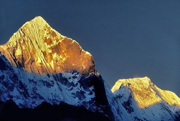Asia, Nepal, Sagarmatha NP. Last light catches Kwangde Peak in Sagarmatha NP, a World Heritage Site