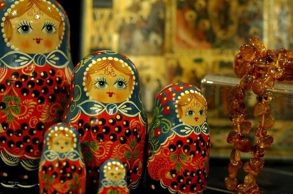 Asia, Russia. Typical Russian handicrafts. Traditional Matrushka (nesting) dolls & amber necklace