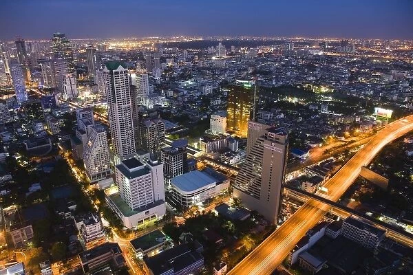 Asia, Thailand, Bangkok. View of the city at twilight from Hotel State Lebua