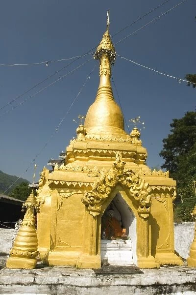 Asia, Thailand, Mae Hong Son, Stupa with Buddha sculpture in it at Wat Hua Wiang