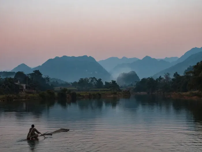 Framed Print : Asia, Vietnam, Pu Luong Nature Reserve. Lone man takes simple raft out onto river Framed Print : Asia, Vietnam, Pu Luong Nature Reserve. Lone man takes simple raft out onto river