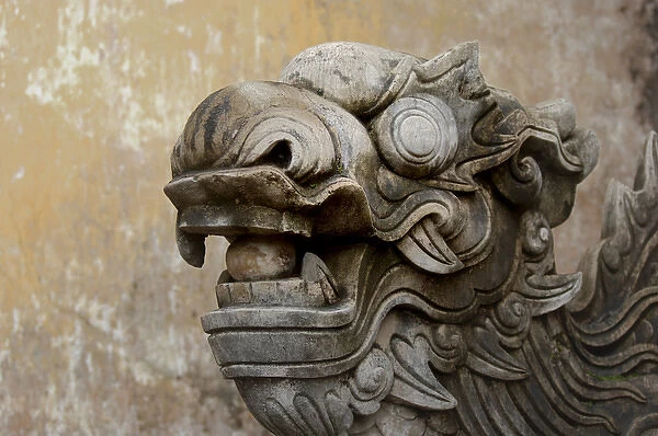 Asia, Vietnam. Stone lion guarding the entrance at the The Citadel, Hue, Thua Thiena'Hue
