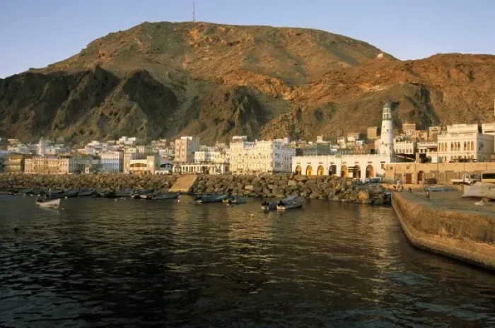 Framed Print : Asia, Yemen, Al-Mukalla. Sunrise on boats in cape