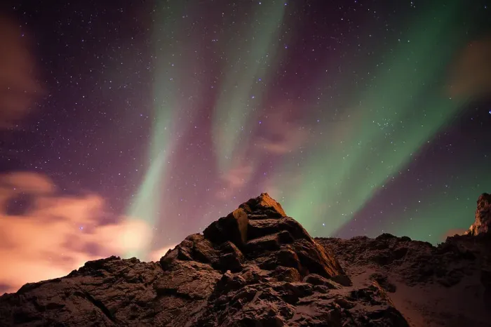 Framed Print : An aurora borealis behind a mountain peak in Andenes. Andenes, Vesteralen Islands, Nordland, Norway Framed Print : An aurora borealis behind a mountain peak in Andenes. Andenes, Vesteralen Islands, Nordland, Norway