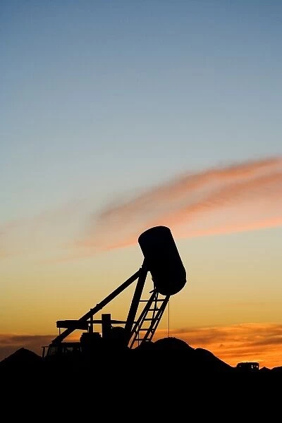 Australia. Silhouette of Blower at Opal Mine, Coober Pedy