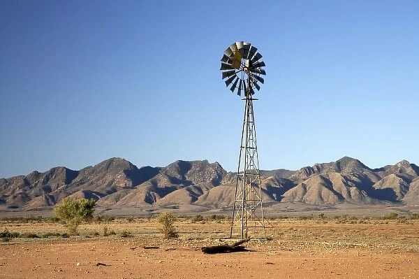 Australia. Windmill and Wilpena Pound, Flinders Ranges, South Australia, Australia