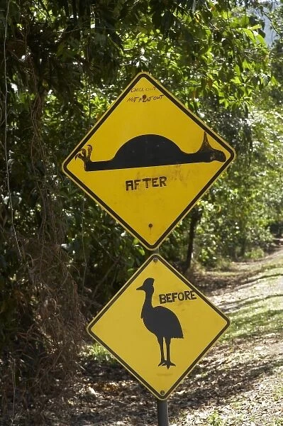 Australia. Altered Cassowary and Road Hump Signs, Daintree National Park 