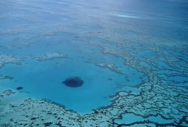 Australia, Queensland. Great Barrier Reef views from the air, Blue Hole