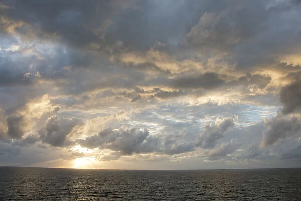Australia, Queensland, Port Douglas. Sunrise over the Coral Sea
