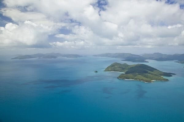 Australia, Queensland, Whitsunday Coast, Whitsunday Islands. Aerial View over the
