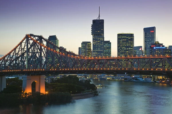 AUSTRALIA, State of Queensland, Brisbane. Evening view of the Story Bridge and Riverside