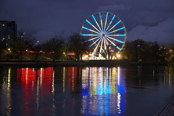 Australia, Victoria, Melbourne, Ferris Wheel Reflected in Yarra River