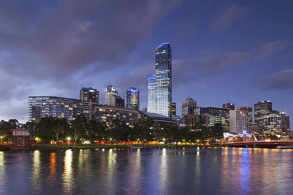 Australia, Victoria, VIC, Melbourne, skyline with Rialto Towers, along Yarra River, dusk