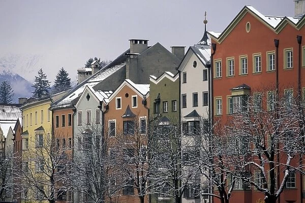 Austria, Tirol, Innsbruck. Colorful buildings along Inn River