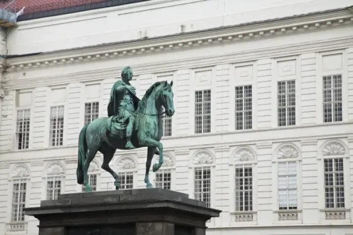 Framed Print : Austria, Vienna. Low angle view of a statue of a man on a horse. The statue is situated Framed Print : Austria, Vienna. Low angle view of a statue of a man on a horse. The statue is situated