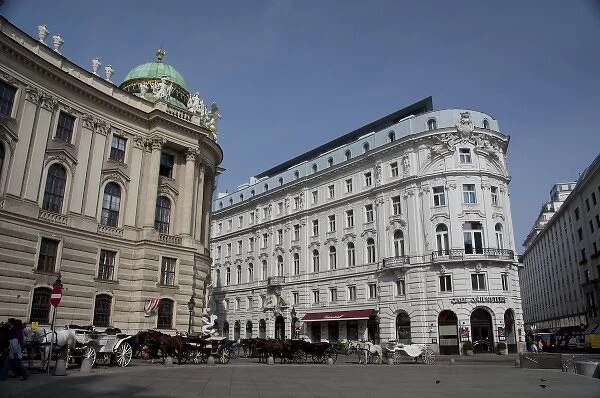 Austria, Vienna. Michaels Square, traditional horse-drawn fiaker (carriage)