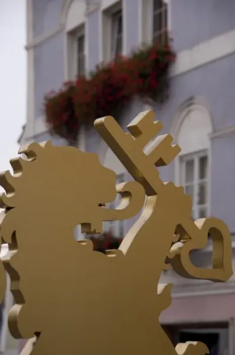 Framed Print : Austria, Wachau Valley, Melk. Historic downtown Melk. Golden lion with key, Melk city symbol
