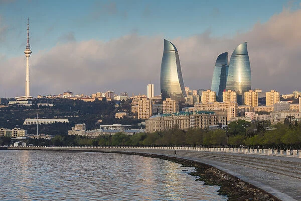 Azerbaijan, Baku. City skyline with Baku Television Tower and Flame Towers from Baku Bay