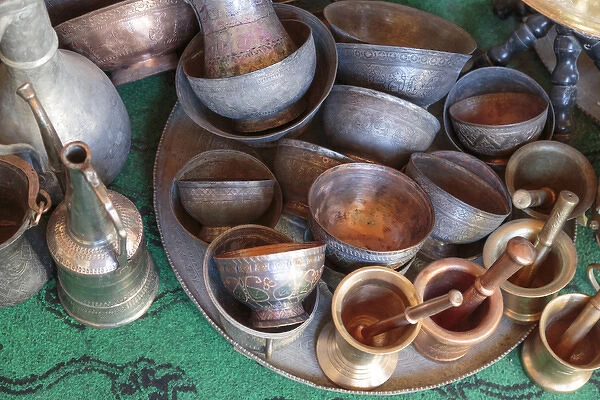 Azerbaijan, Lahic. A collection of engraved copper cups and mortars