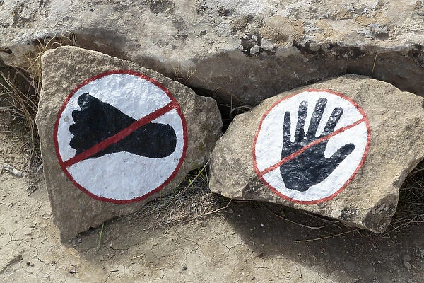 Azerbaijan, Qobustan. A warning to not touch or walk on the rocks at Gobustan National