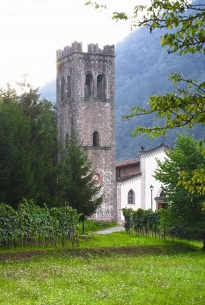 Bagni di Lucca, Tuscany, Italy - Grass lawn leading up to an old world church in a rural area