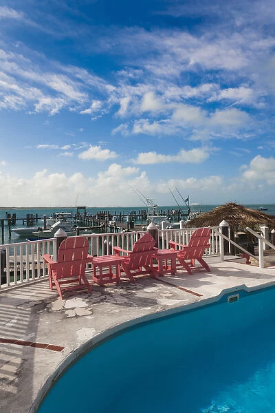 Bahamas, Eleuthera Island, Harbour Island, Dunmore Town, pool view over marina