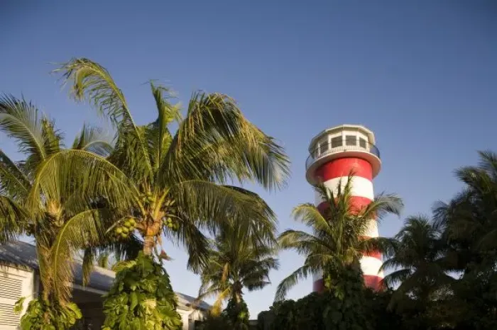 Framed Print : Bahamas, Grand Bahama Island, Freeport, Setting sun lights lighthouse exterior Framed Print : Bahamas, Grand Bahama Island, Freeport, Setting sun lights lighthouse exterior