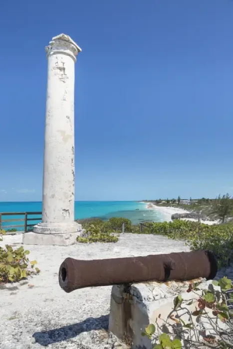 Framed Print : Bahamas, Little Exuma Island. Rusty cannon and column marking salt ponds location