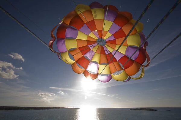 Bahamas, New Providence Island, Nassau, Parasailing parachute in flight above Cable
