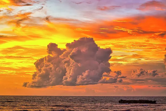 Framed Print : Bali's sunsets are often considered postcard-perfect, with their stunning colors and breathtaking scenery. Here is a Black and White at sunset high tide Framed Print : Bali's sunsets are often considered postcard-perfect, with their stunning colors and breathtaking scenery. Here is a Black and White at sunset high tide