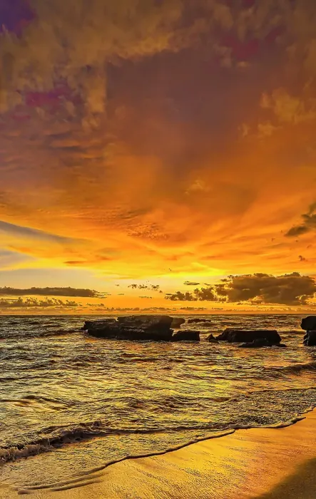 Framed Print : Bali's sunsets are often considered postcard-perfect, with their stunning colors and breathtaking scenery. Here is a Black and White at sunset high tide