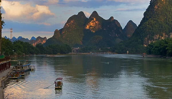 Bamboo raft on Li River with karst hills, Xingping, Yangshuo, Guangxi, China