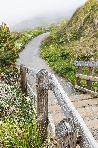 Bandon, Oregon, USA. A paved walking path on the Oregon coast