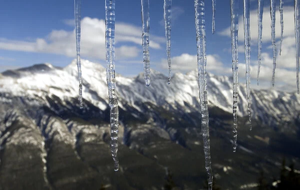 Banff, Alberta, Canada. Icicles and the Rocky Mountains from the top of Sulphur Mountain