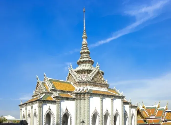 Framed Print : Bangkok, Thailand - A Buddhist temple with an ornately decorated roof and white walls Framed Print : Bangkok, Thailand - A Buddhist temple with an ornately decorated roof and white walls