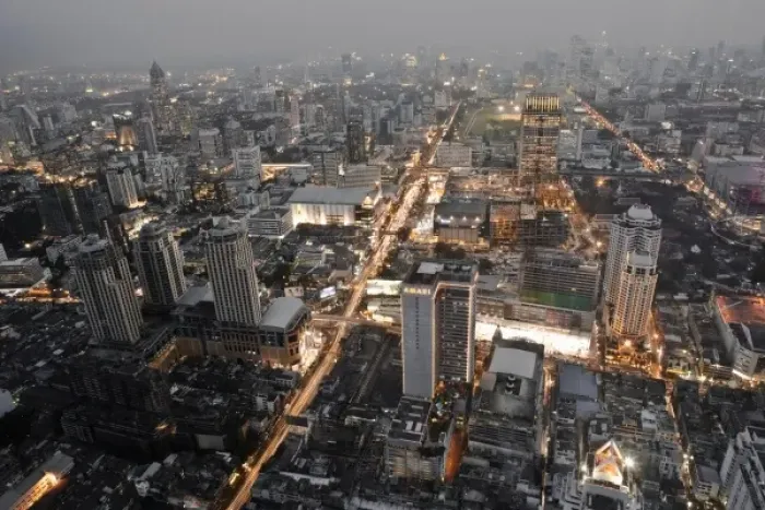 Framed Print : Bangkok, Thailand - The downtown district of a city at dusk with smog in the background Framed Print : Bangkok, Thailand - The downtown district of a city at dusk with smog in the background