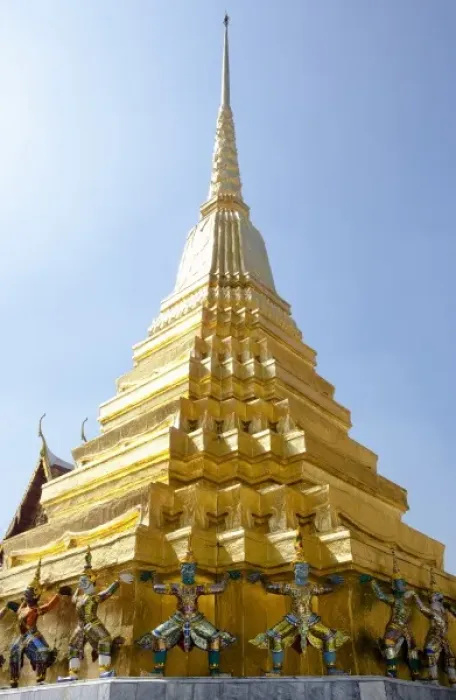 Framed Print : Bangkok, Thailand - Golden statues are holding a golden tiered building over their head