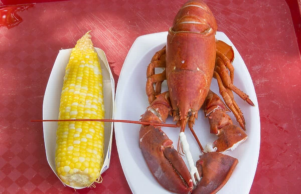 Bar Harbor Maine traditional lobster dinner with corn specialty of Maine