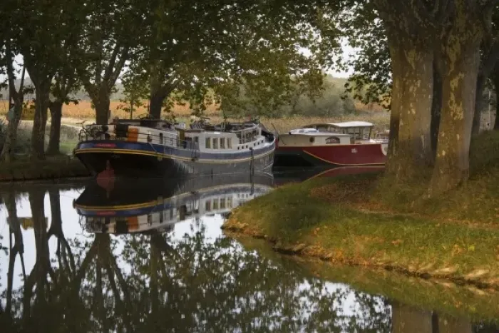 Framed Print : Barges tied up along bank of the Canal du Midi, Aude, Languedoc, France Framed Print : Barges tied up along bank of the Canal du Midi, Aude, Languedoc, France