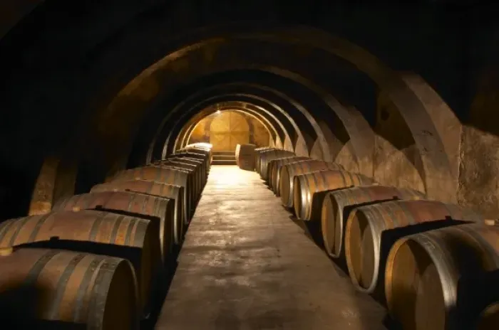 Framed Print : The barrel aging cellar with lines of barriques and dramatic lighting. Chateau Mourgues Framed Print : The barrel aging cellar with lines of barriques and dramatic lighting. Chateau Mourgues