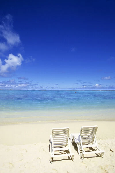 Beach chairs on beach Raratonga, Cook Islands