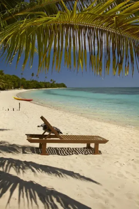 Framed Print : Beach, palm trees and lounger, Plantation Island Resort, Malolo Lailai Island, Mamanuca Islands