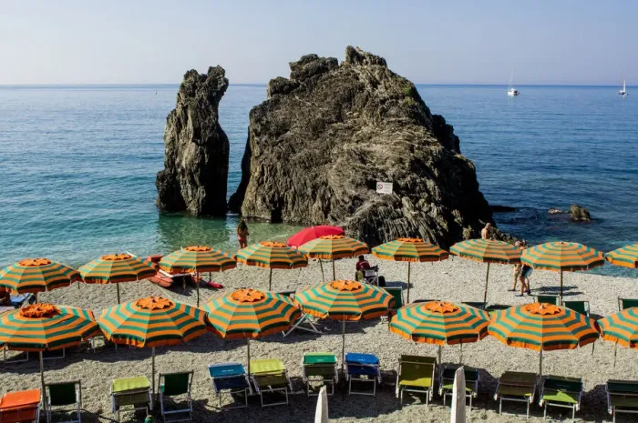 Framed Print : Beach umbrellas lining the beach in Monterosso al Mare, Cinque Terre, Italy Framed Print : Beach umbrellas lining the beach in Monterosso al Mare, Cinque Terre, Italy