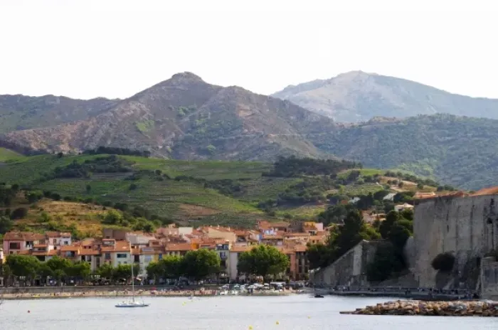Framed Print : The beach in the village. The chateau in Collioure harbour. Collioure. Roussillon