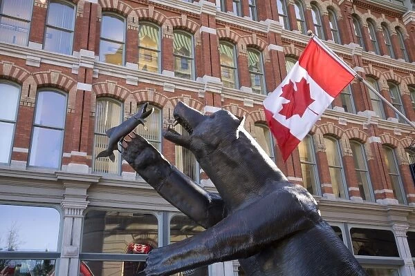 Bear statue with Canadaian flag in Ottawa