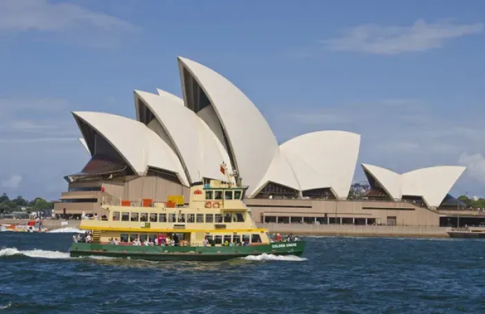 Framed Print : Beautiful closeup of famous Sydney Opera House in Sydney Harbour with ferry passing Framed Print : Beautiful closeup of famous Sydney Opera House in Sydney Harbour with ferry passing