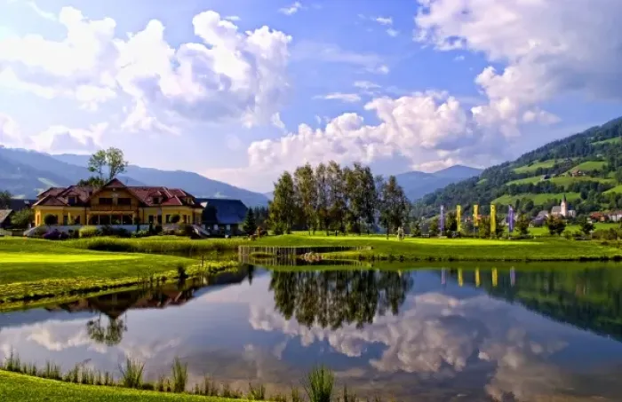Framed Print : Beautiful golf with golfers at the #18 hole at exclusive Golf Club Murau Kreischberg Framed Print : Beautiful golf with golfers at the #18 hole at exclusive Golf Club Murau Kreischberg